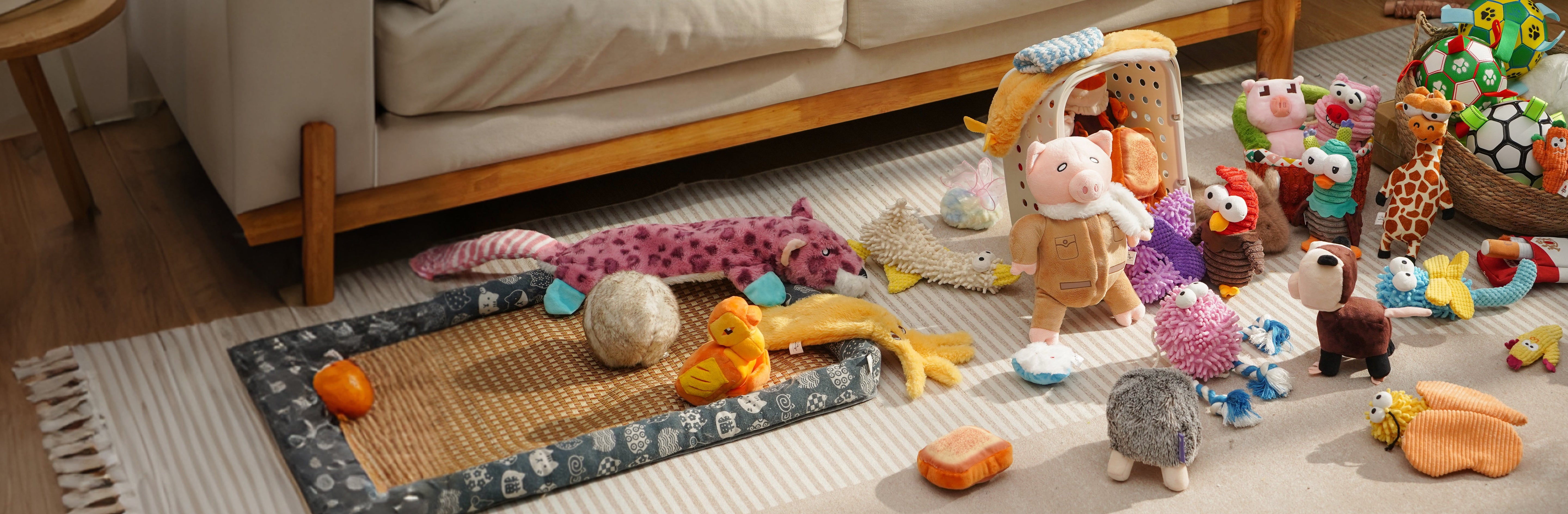 Colorful assortment of eco-friendly plush toys and durable outdoor toys for pets in the All Toys collection.